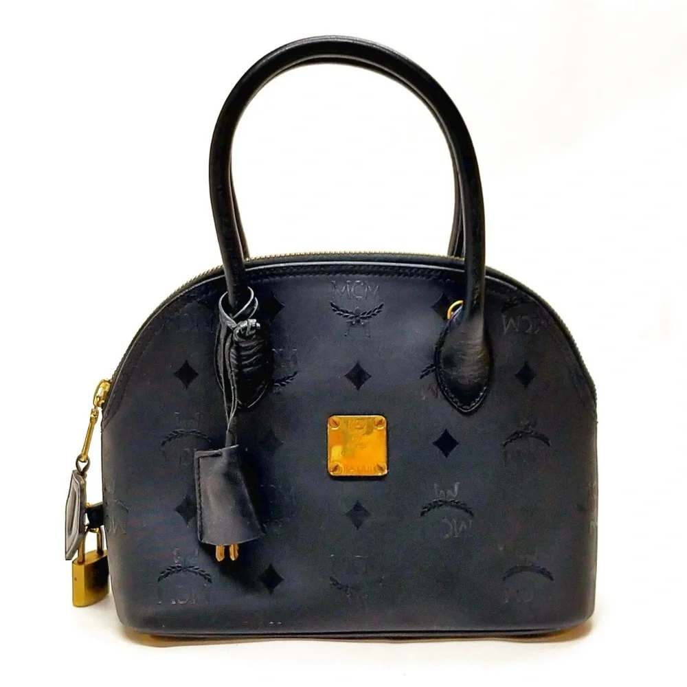 MCM Black Satchel with Gold Accents lock and key included authentic